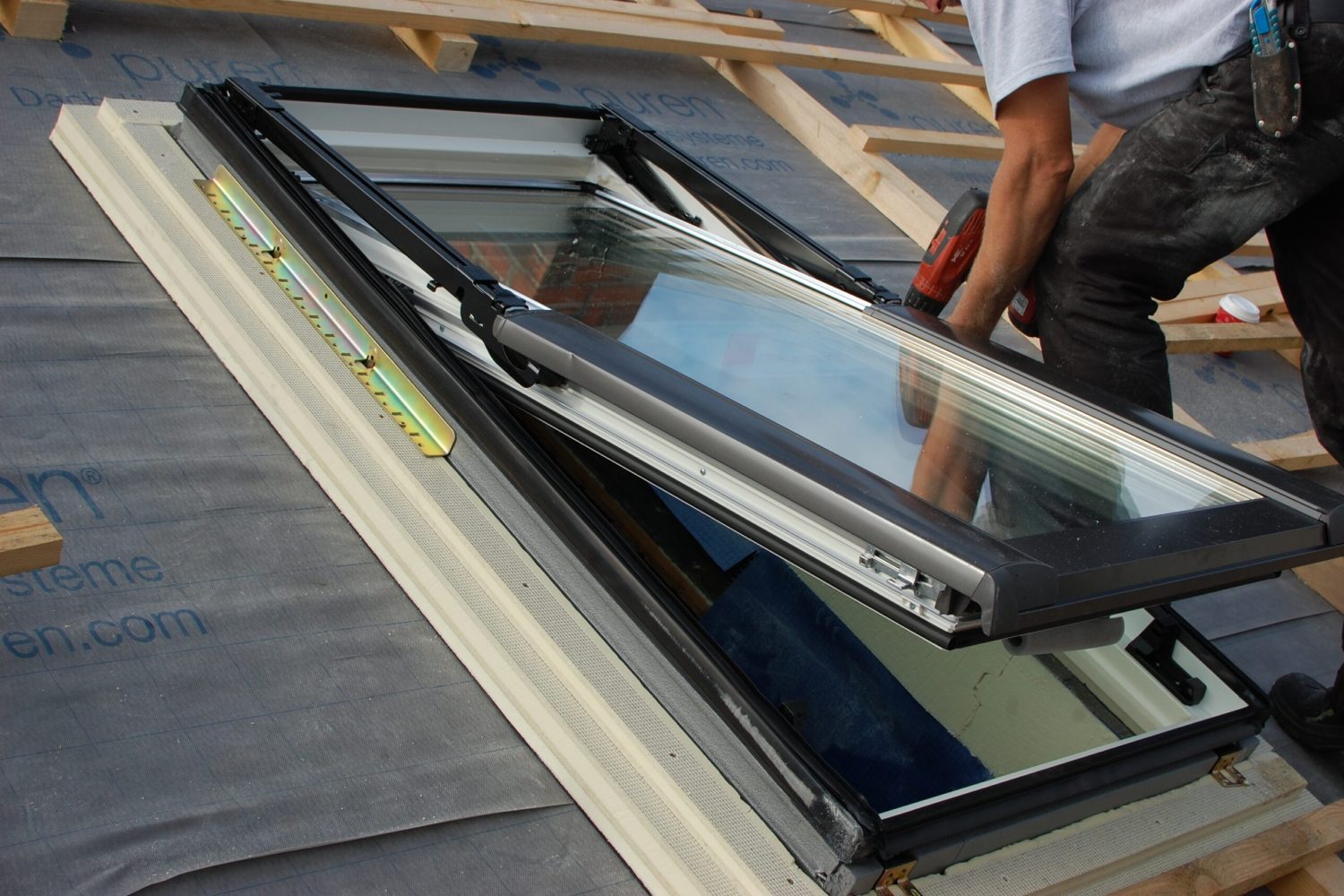 assembling-fitting-a-roof-window-skylight-with-2023-11-27-05-07-57-utc (5)